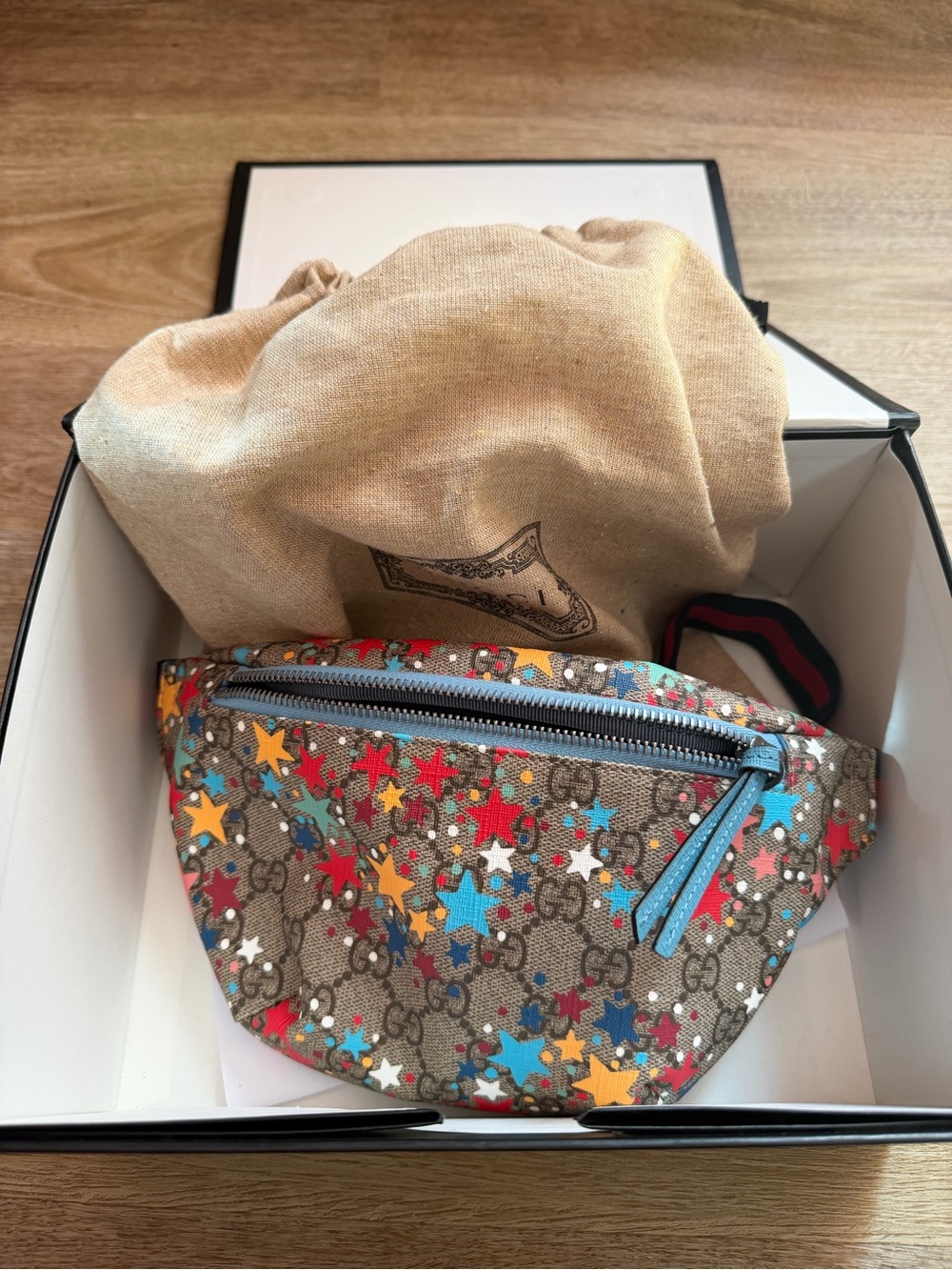 Gucci  GG Canvas Belt Bag with Multicolor Stars.